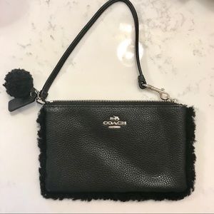 NWOT COACH wristlet with pompom and furry lining